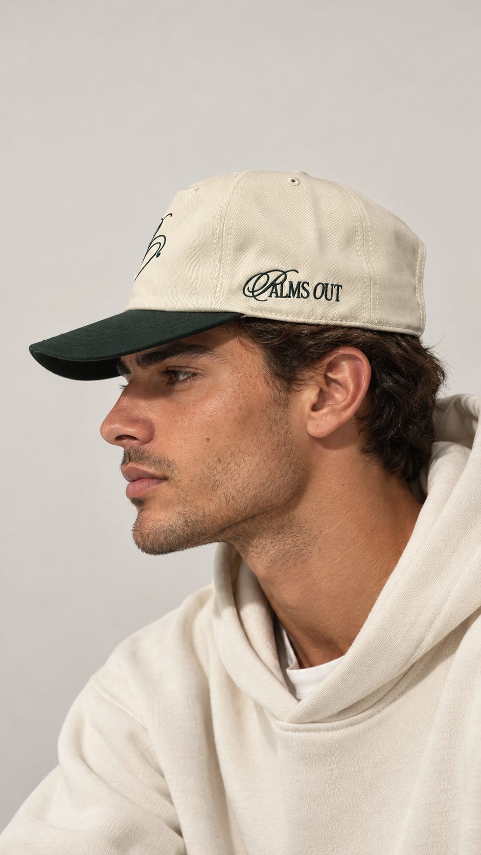 Model wearing the Palms Out 5-Panel Unstructured cap in profile