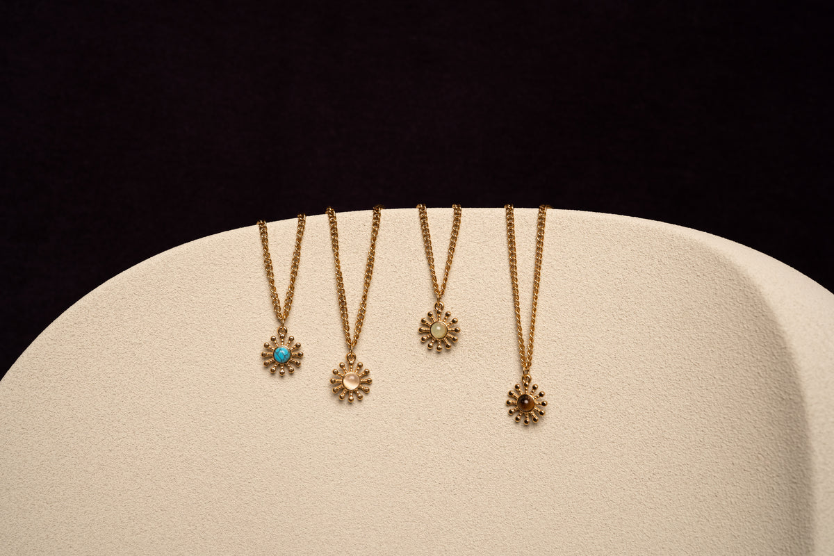 AMALFI sun pendant gold necklace, styled flatlay — Palms Out