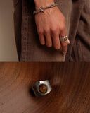 CAIRO tiger's eye statement ring in sculptural stainless steel setting, product photo on white background